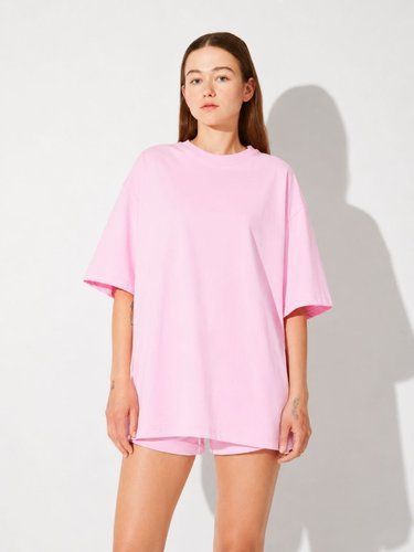 Жіночий рожевий костюм із шортами та футболкою oversize L